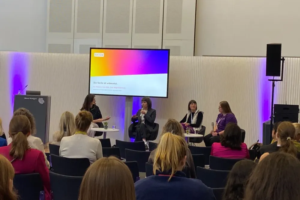 Panel discussion at the Female FutureTech Summit at Messe Stuttgart, four women on stage in front of an audience